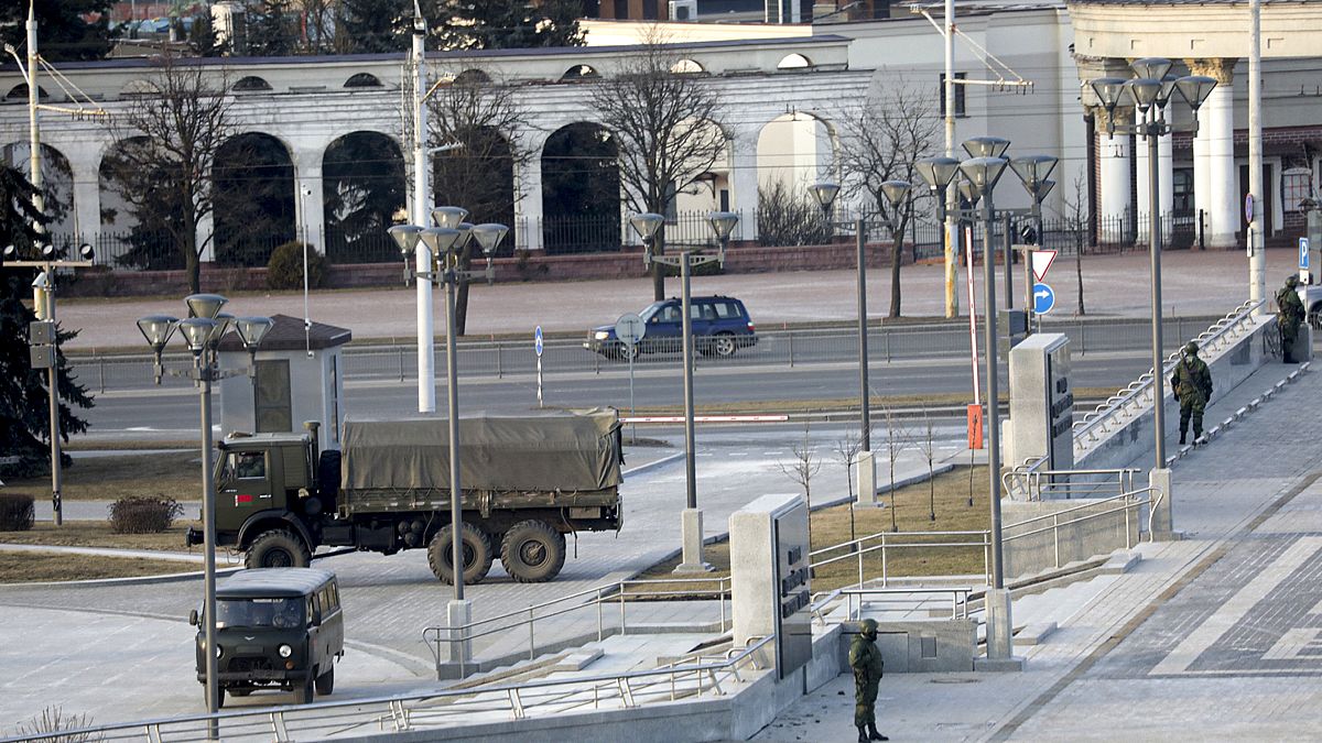 Belarusian interior ministry guard an empty street to prevent a rally in March.