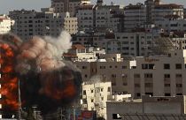 An Israeli air strike hits a building in Gaza City, Monday, May 17, 2021. 