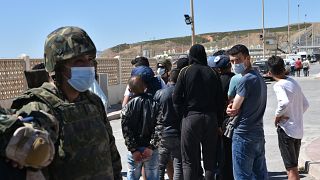 EU, Spain warn Morocco on migrants 
