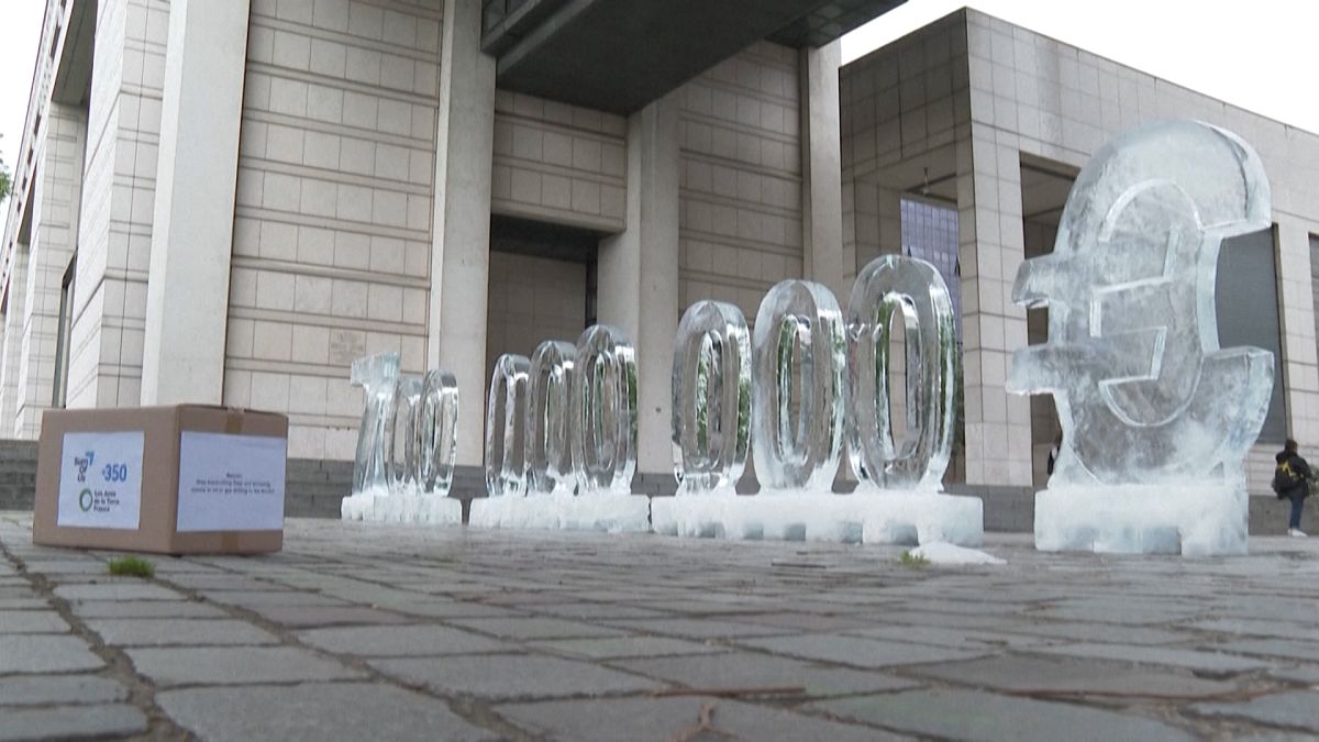  Ice sculptures in front of Bercy against a project to build a Total plant in the Russian Arctic.