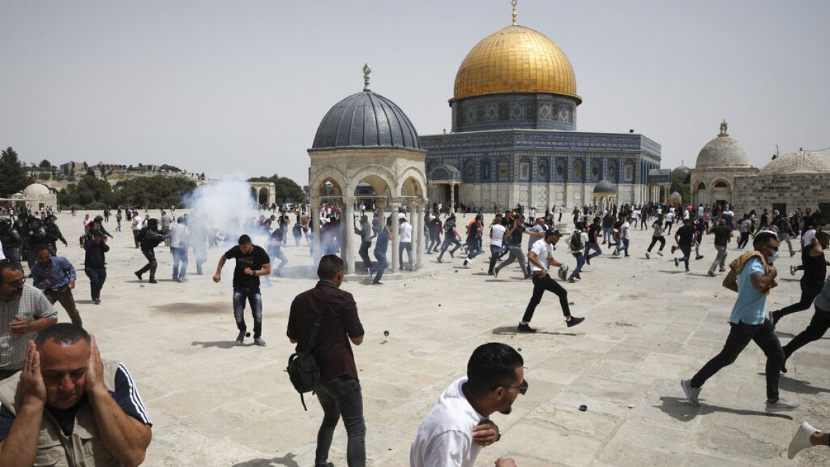 Protesters and police clash at Al-Aqsa mosque in the aftermath of a devastating 11-day war between Israel and Hamas