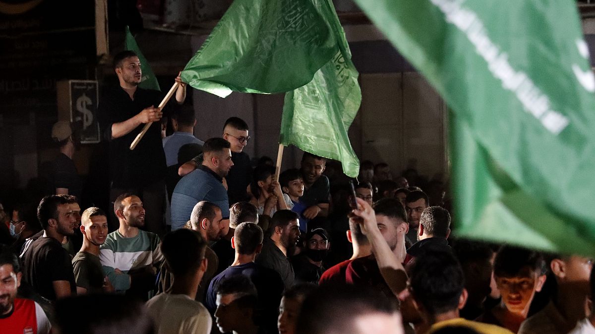 Los palestinos de Gaza celebran el alto el fuego entre Israel y Hamás