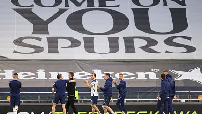 Tottenham Hotspur players at the end of their English Premier League match against Aston Villa at the Tottenham Hotspur Stadium in London, May 19, 2021. 