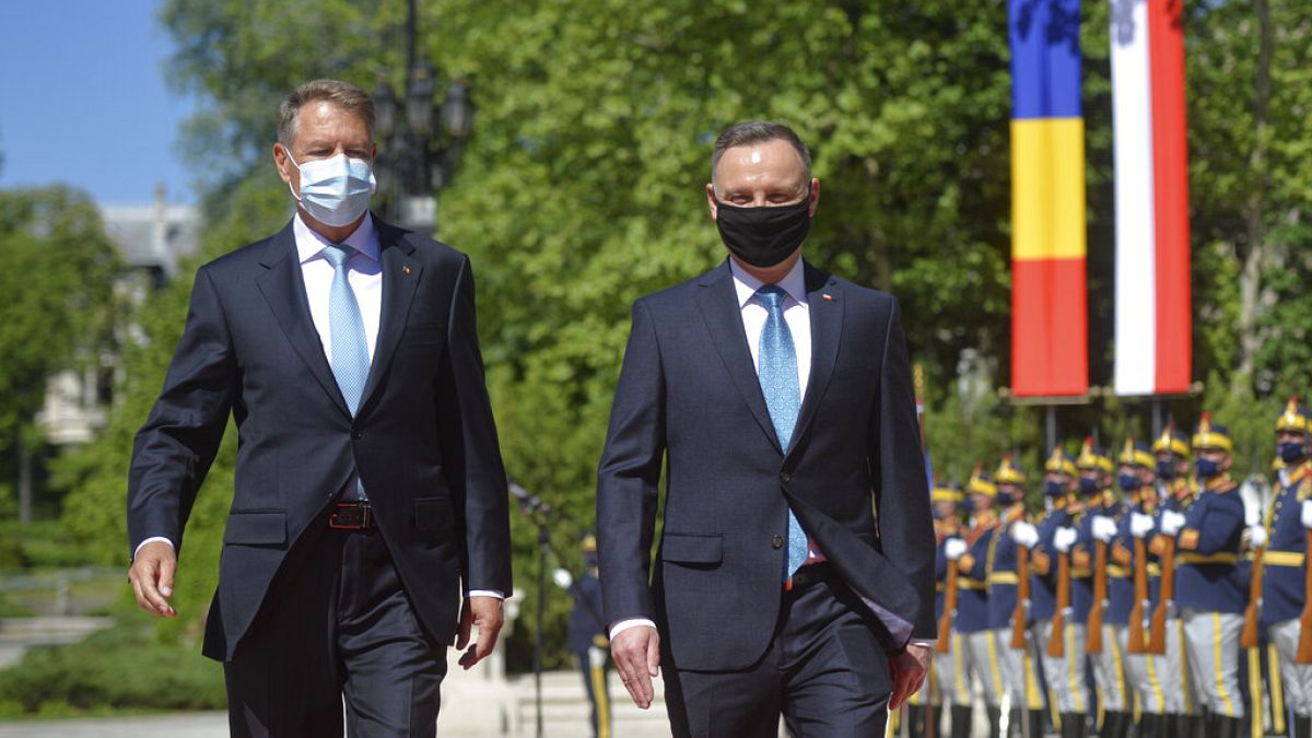 Romania and Poland's presidents during a diplomatic visit
