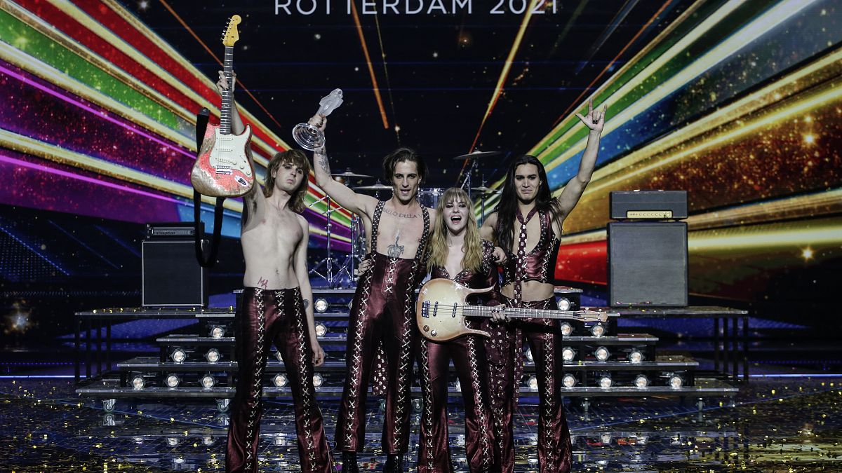 Maneskin from Italy celebrate with the trophy after winning the Grand Final of the Eurovision Song Contest at Ahoy arena in Rotterdam, Netherlands, Saturday, May 22, 2021. 