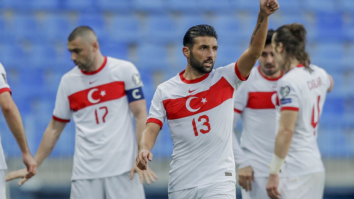 Turkey's Ozan Tufan celebrates during the 2022 FIFA World Cup qualifying match against Norway.