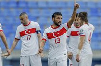 Turkey's Ozan Tufan celebrates during the 2022 FIFA World Cup qualifying match against Norway.