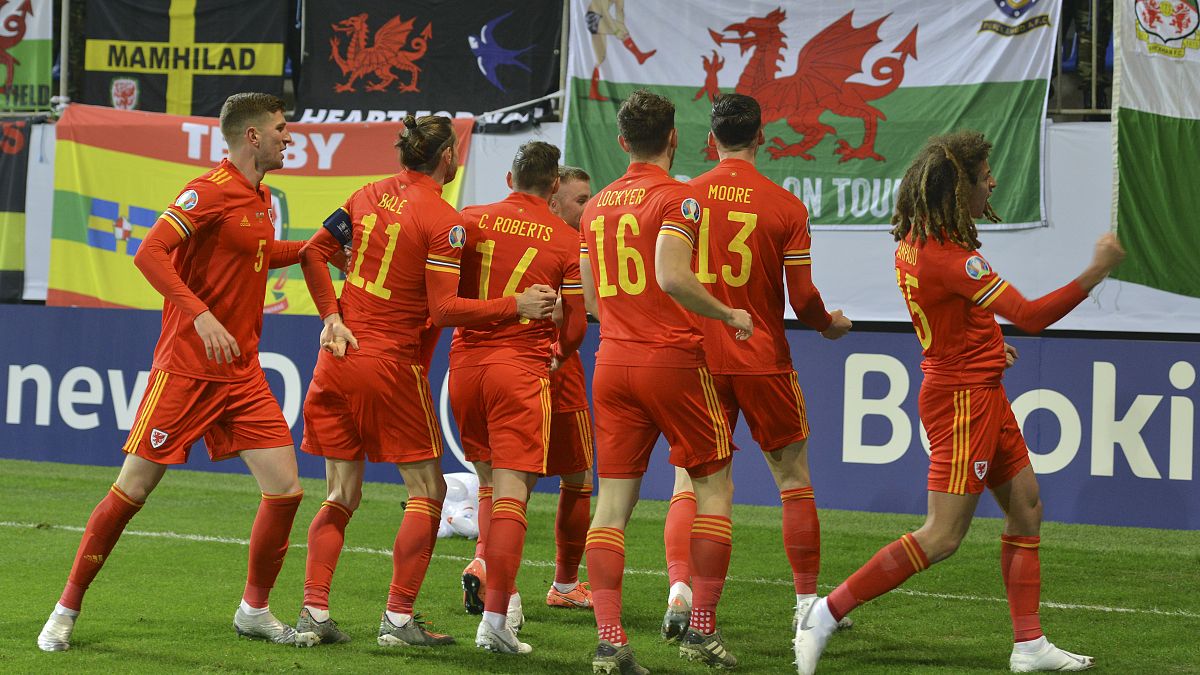 Wales' players celebrate after scoring the opening goal during their UEFA Euro 2020 qualifying match against Azerbaijan.