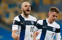 Finland's Teemu Pukki celebrates after scoring a penalty during the 2022 FIFA World Cup qualifying match against Ukraine.