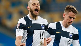 Finland's Teemu Pukki celebrates after scoring a penalty during the 2022 FIFA World Cup qualifying match against Ukraine.