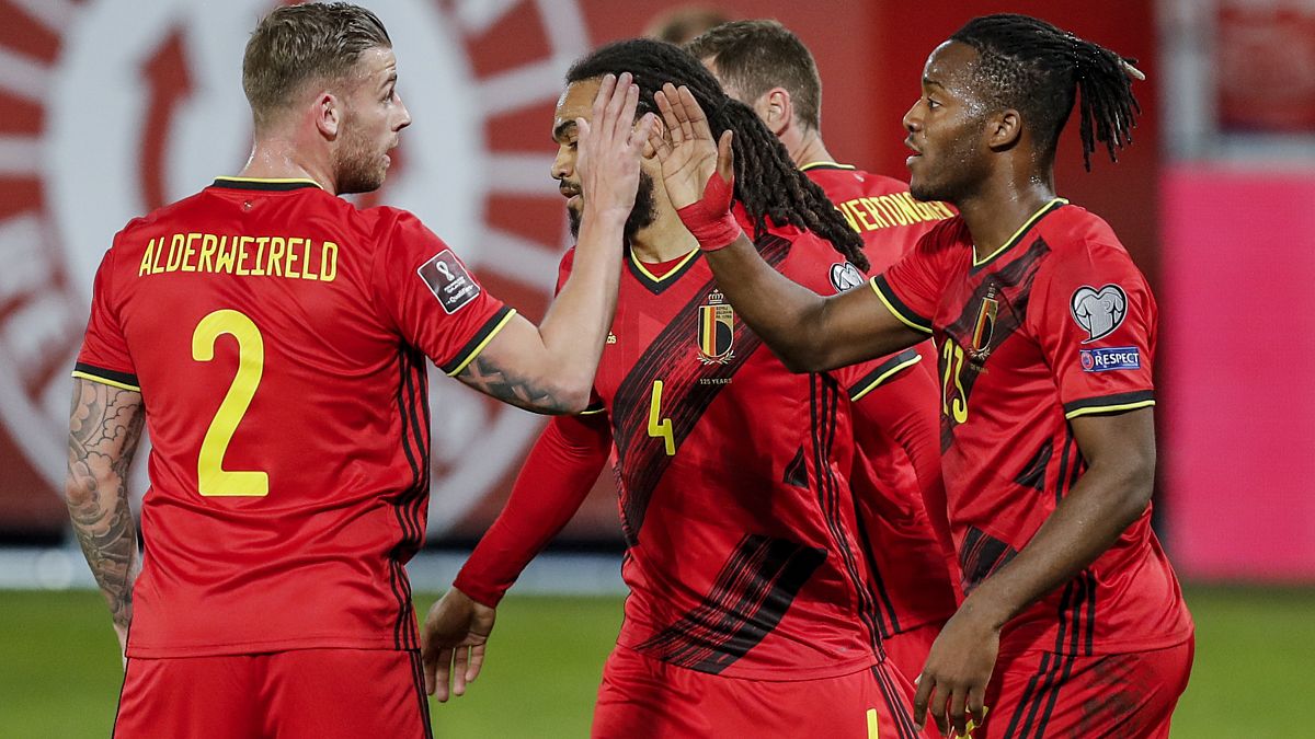 Belgium's players celebrate after scoring during a 2022 FIFA World Cup qualifying match against Belarus.