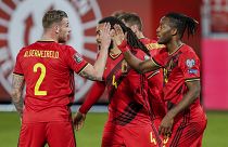 Belgium's players celebrate after scoring during a 2022 FIFA World Cup qualifying match against Belarus.