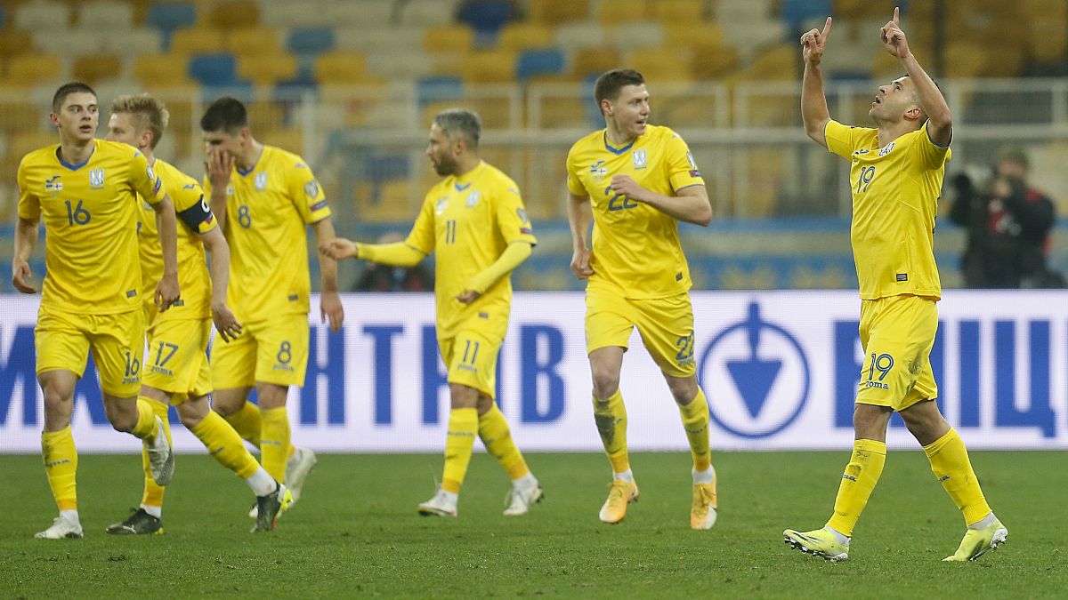Ukraine's Junior Moraes celebrates after scoring his team's first goal during their 2022 FIFA World Cup qualifying match against Finland.