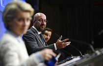 European Council President Charles Michel, center, speaks during a media conference at an EU summit in Brussels, Tuesday, May 25, 2021.