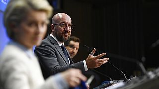 European Council President Charles Michel, center, speaks during a media conference at an EU summit in Brussels, Tuesday, May 25, 2021. 