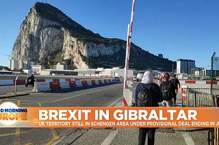 People walking across Gibraltar.