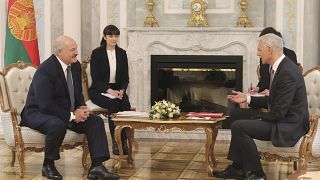 Belarusian President Alexander Lukashenko, left, and Prime Minister of Latvia Krisjanis Karins talk during their meeting in Minsk, Belarus, Thursday, Jan. 16, 2020. 