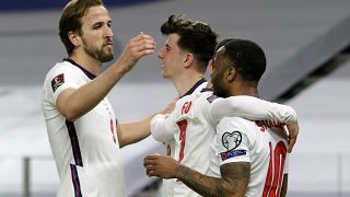 England's players celebrate during their 2022 FIFA World Cup qualifying match against Albania.
