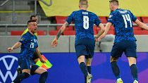Slovakia's players celebrate their opening goal during the 2022 FIFA World Cup qualifying match against Russia.