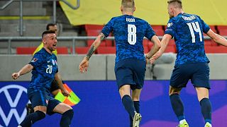 Slovakia's players celebrate their opening goal during the 2022 FIFA World Cup qualifying match against Russia.