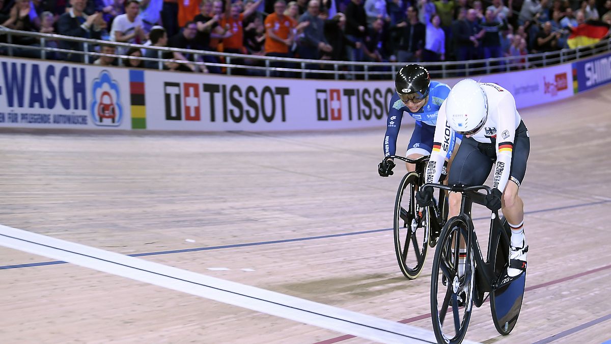 Germany's Emma Hinze (R) wins ahead of Hong Kong's Wai Sze Lee during the Women's speed semifinal during the Cycling World Championship in Berlin, Germany, Feb 28, 2020.