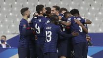 France's players celebrate their opening goal during the 2022 FIFA World Cup qualifying match against Ukraine.