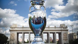 The UEFA European Football Championship trophy is pictured during a presentation at the Gorky Park in Moscow on May 24, 2021