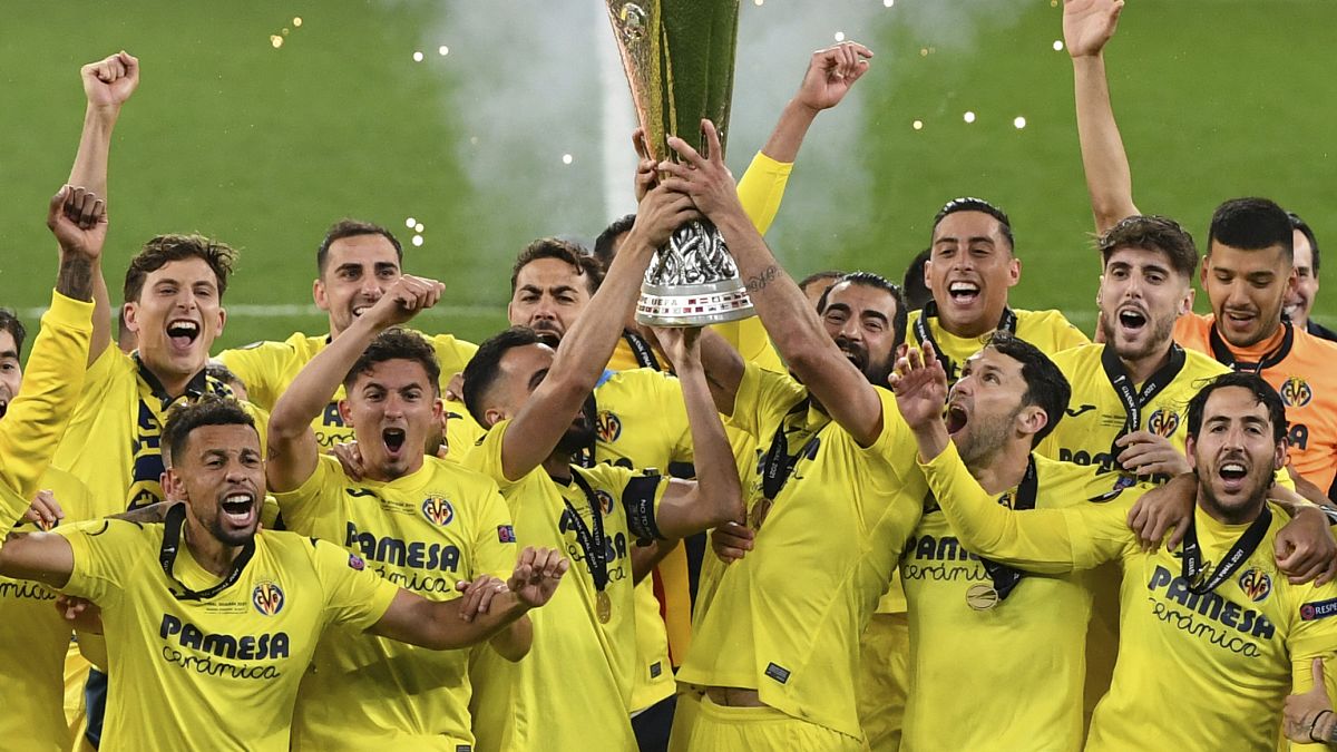 Villarreal players lift the trophy after the Europa League final soccer match between Manchester United and Villarreal in Gdansk, Poland, May 26, 2021.
