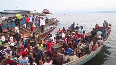 Residents escape Goma by boat amid eruption fears