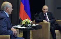 Russian President Vladimir Putin, right, listens to Belarusian President Alexander Lukashenko during a meeting in the Black Sea resort of Sochi, Russia, Friday, May 28, 2021.