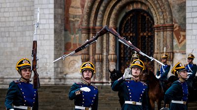 Soldiers of the Presidential Regiment take part in a ceremony of the Changing of the Guard at the Sobornaya (Cathedral) Square of the Kremlin in Moscow.