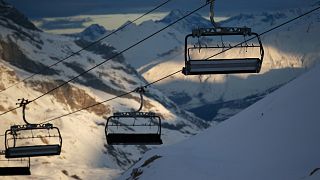 Chairlifts are stopped to stop the spread of the COVID-19 pandemic, in the ski resort of Val d'Isere, France, Dec. 18, 2020.