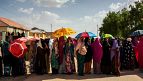Moroccan migrants queue to seek asylum in Spain