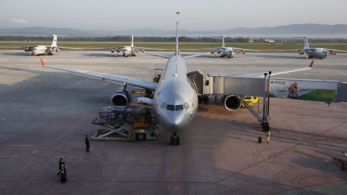 FILE: An Aeroflot Airbus parks in front of older Russian-made planes at the terminal in Vladivostok airport in Vladivostok, Russia, Tuesday, Sept. 11, 2012.