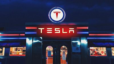 A Euronews composite image of what a diner at a Tesla charging station could look like. A Euronews composite image of what a diner at a Tesla charging station could look like.