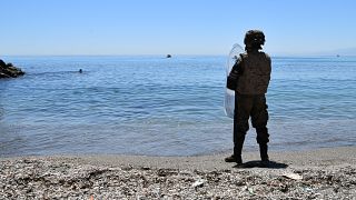 A Spanish soldier stands guard in the Spanish enclave of Ceuta