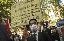 Hong Kong activist Nathan Law, centre, taking part in an anti-Beijing protest in Berlin, Germany.