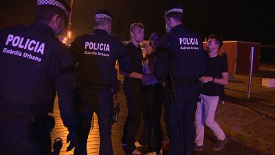  SPAIN police evacuate nearly 5,000 youth