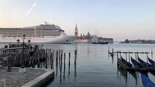 ruise ship MSC Orchestra passes in the Giudecca Canal in Venice, Italy, early Thursday, June 3, 2021. 