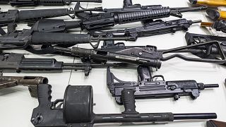 In this Dec. 27, 2012, file photo are some of the weapons that include handguns, rifles, shotguns and assault weapons, collected in a Los Angeles Gun Buyback event.