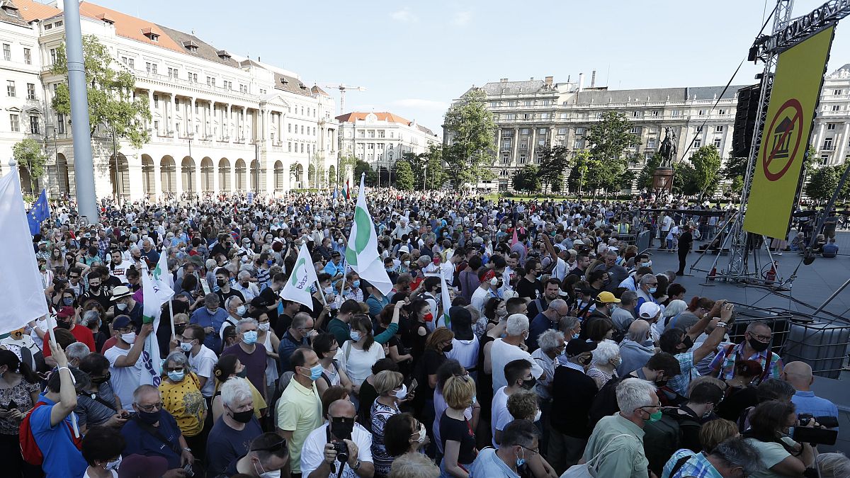 Protesters gather in downtown Budapest, Hungary, Saturday, June 5, 2021. 