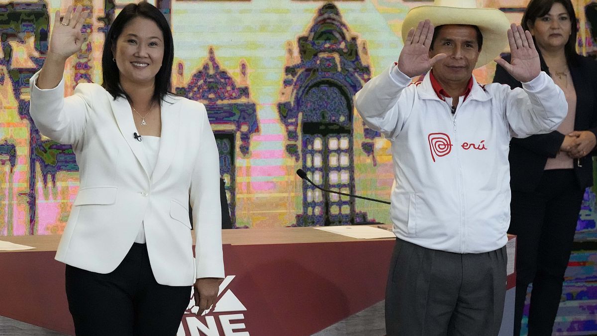 Keiko Fujimori, of the Popular Force party, left, and Free Peru party presidential candidate Pedro Castillo