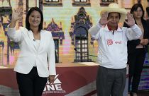 Keiko Fujimori, of the Popular Force party, left, and Free Peru party presidential candidate Pedro Castillo