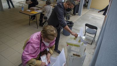 People cast their vote at a polling station, in Mexico City, on June 6, 2021