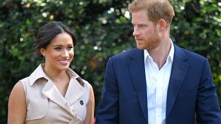 In this Oct. 2, 2019, file photo, Britain's Prince Harry and Meghan Markle appear.