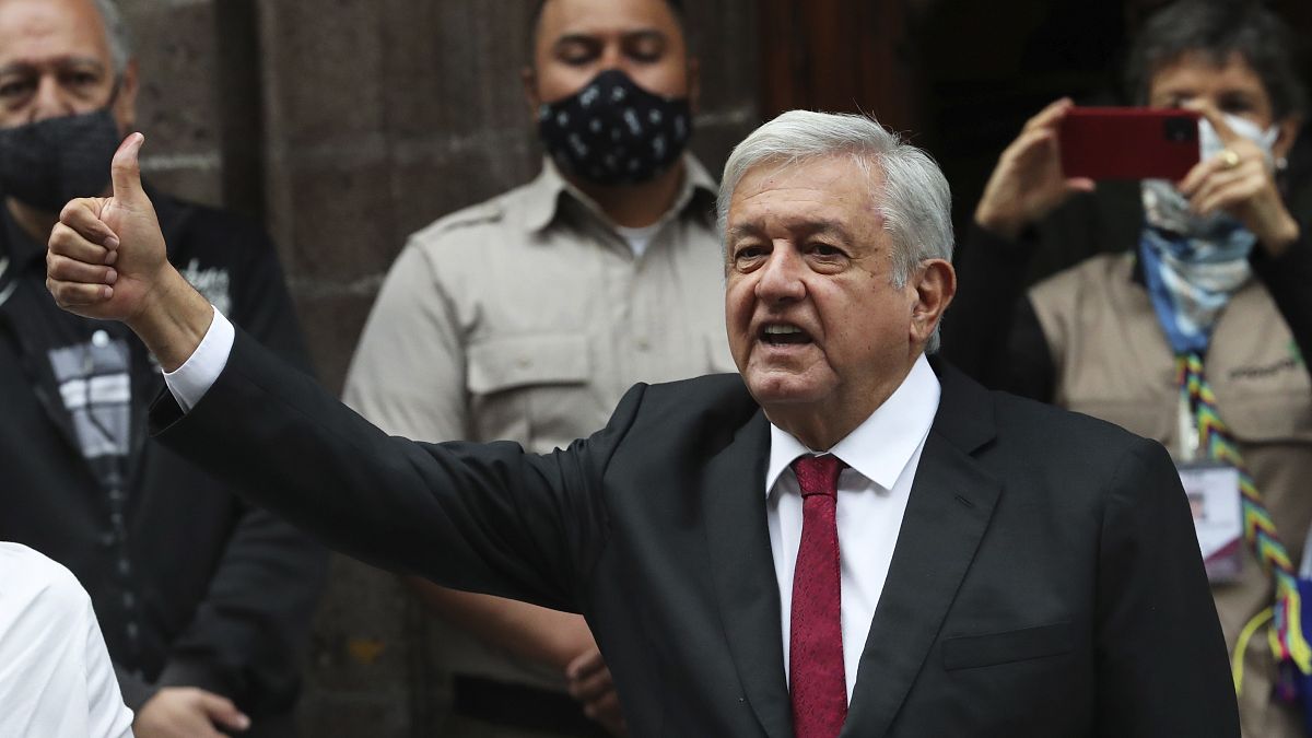 Mexico's President Andres Manuel Lopez Obrador thumbs up after voting in congressional, state and local elections in Mexico City, June 6, 2021. 