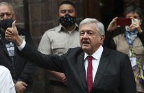 Mexico's President Andres Manuel Lopez Obrador thumbs up after voting in congressional, state and local elections in Mexico City, June 6, 2021.