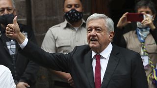 Mexico's President Andres Manuel Lopez Obrador thumbs up after voting in congressional, state and local elections in Mexico City, June 6, 2021. 