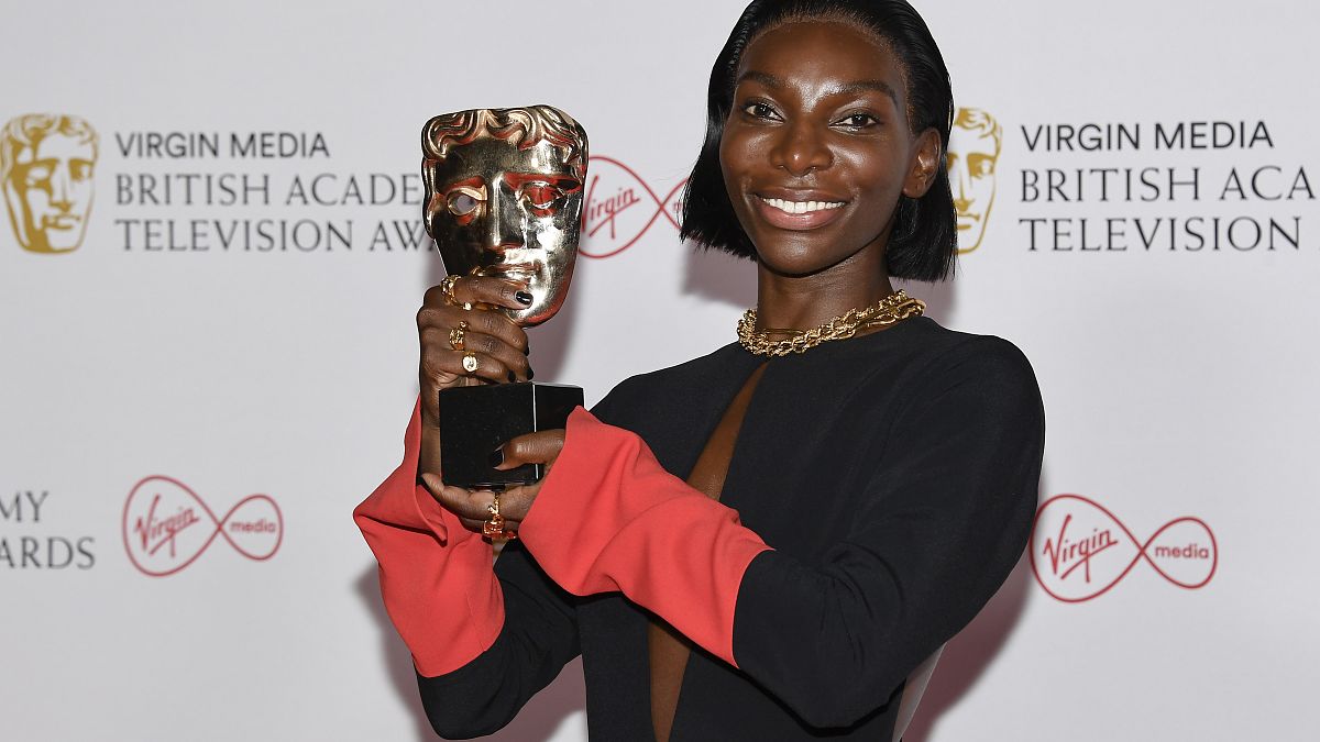 Michaela Coel poses for photographers with his Leading Actress award for her role in 'I May Destroy You' at the British Academy Television Awards in London, June 6, 2021.