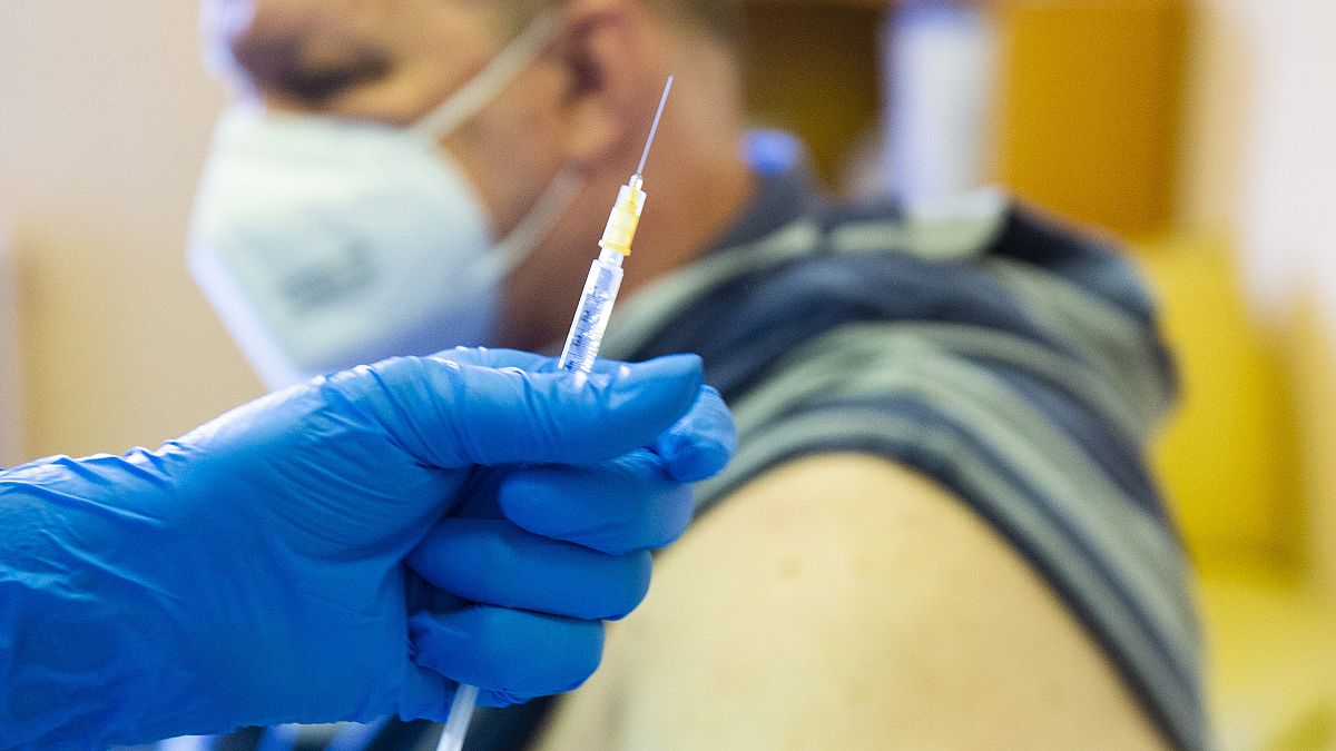 A man is administered the Sputnik V COVID-19 vaccine in Bratislava, Slovakia, Monday June 7, 2021.
